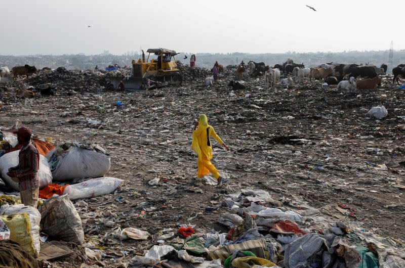 The Wider Image: "Fear will not fill our bellies": why Indian scavengers risk their lives amid coronavirus debris