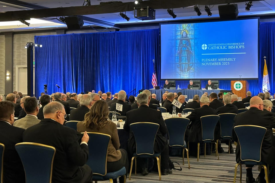 The nation’s Catholic bishops gather for their annual fall meeting in at the Marriott Waterfront hotel in Baltimore on Tuesday, Nov. 14, 2023. On Tuesday, the Catholic leaders called for peace in a war-torn world and unity amid strife within their own clerical ranks. (AP Photo/Tiffany Stanley)