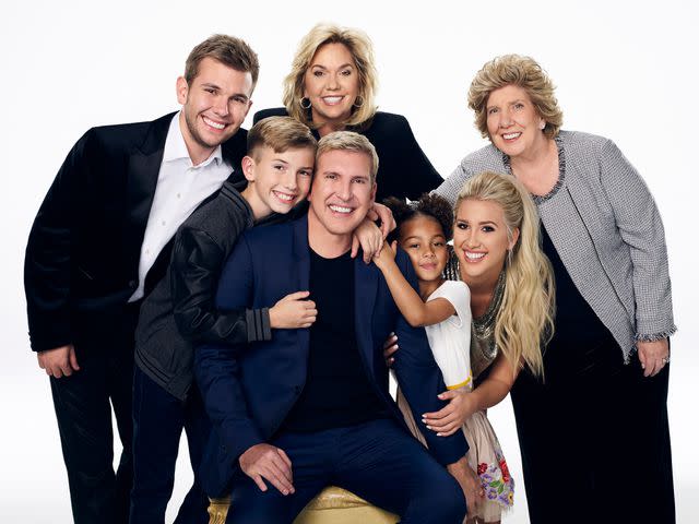 Dennis Leupold/USA Network/NBCU Photo Bank/NBCUniversal (L-R) Chase Chrisley, Grayson Chrisley, Julie Chrisley, Todd Chrisley, Chloe Chrisley, Savannah Chrisley and Faye Chrisley pictured in a promotional still for 'Chrisley Knows Best'.