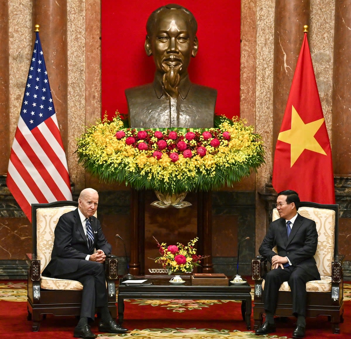 Joe Biden and Vietnam’s president Vo Van Thuong hold a meeting at the Presidential Palace in Hanoi (AP)