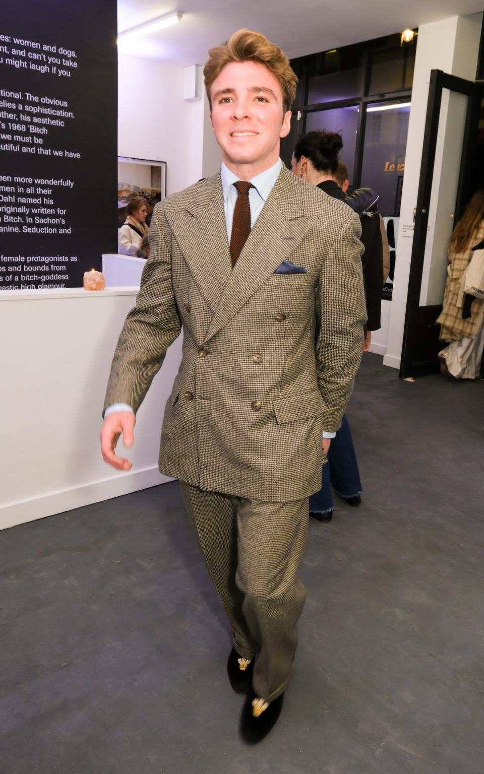 Rocco Ritchie attends a private view of Bitches by artist Daniel Sachon in London