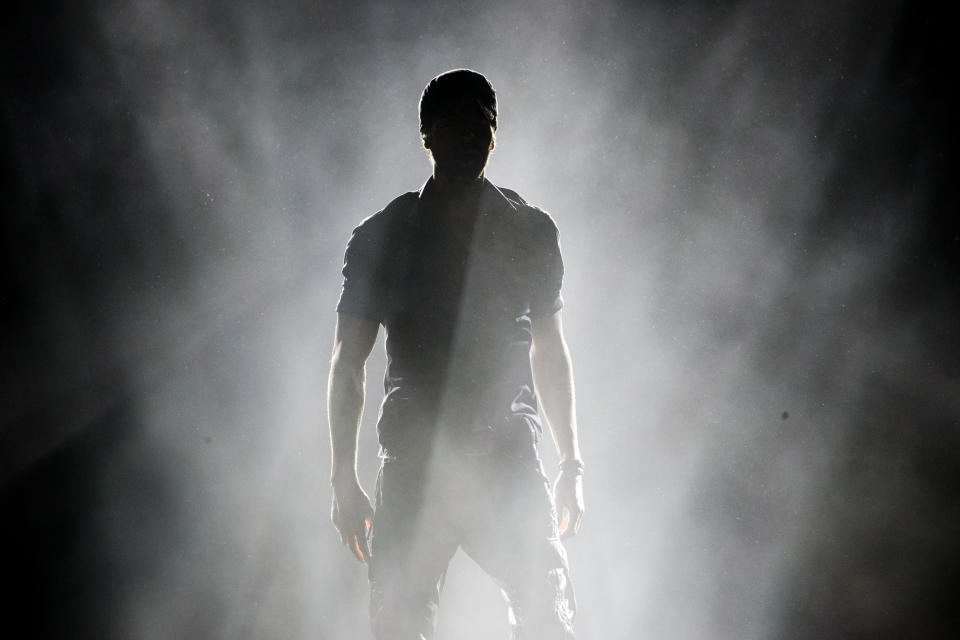 Spanish singer Enrique Iglesias performs on stage in Tel Aviv, Israel, Sunday, May 27, 2018. (AP Photo/Ariel Schalit)