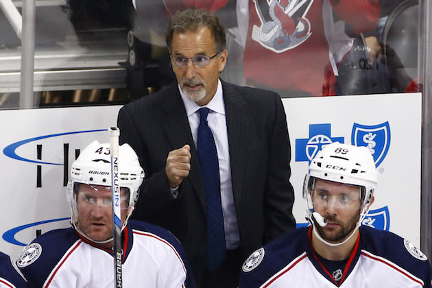 Columbus Blue Jackets head coach John Tortorella stands behind his bench during the first period of an exhibition NHL hockey game against the Pittsburgh Penguins in Pittsburgh, Saturday, Oct. 8, 2016. (AP Photo/Gene J. Puskar)