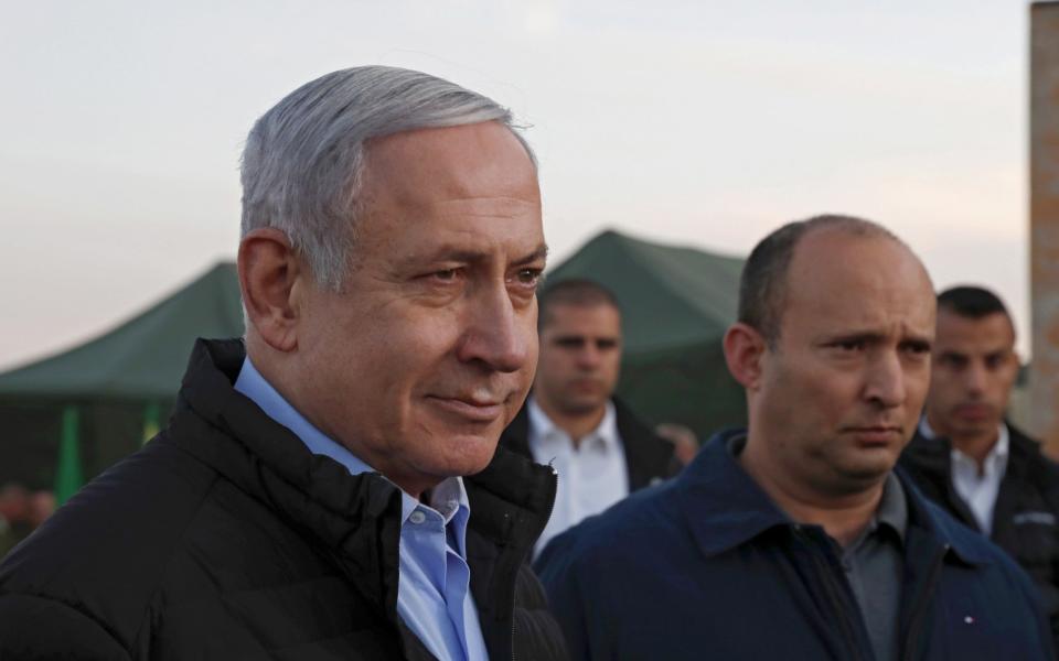  Benjamin Netanyahu (L) and Naftali Bennett  - ATEF SAFADI/REX