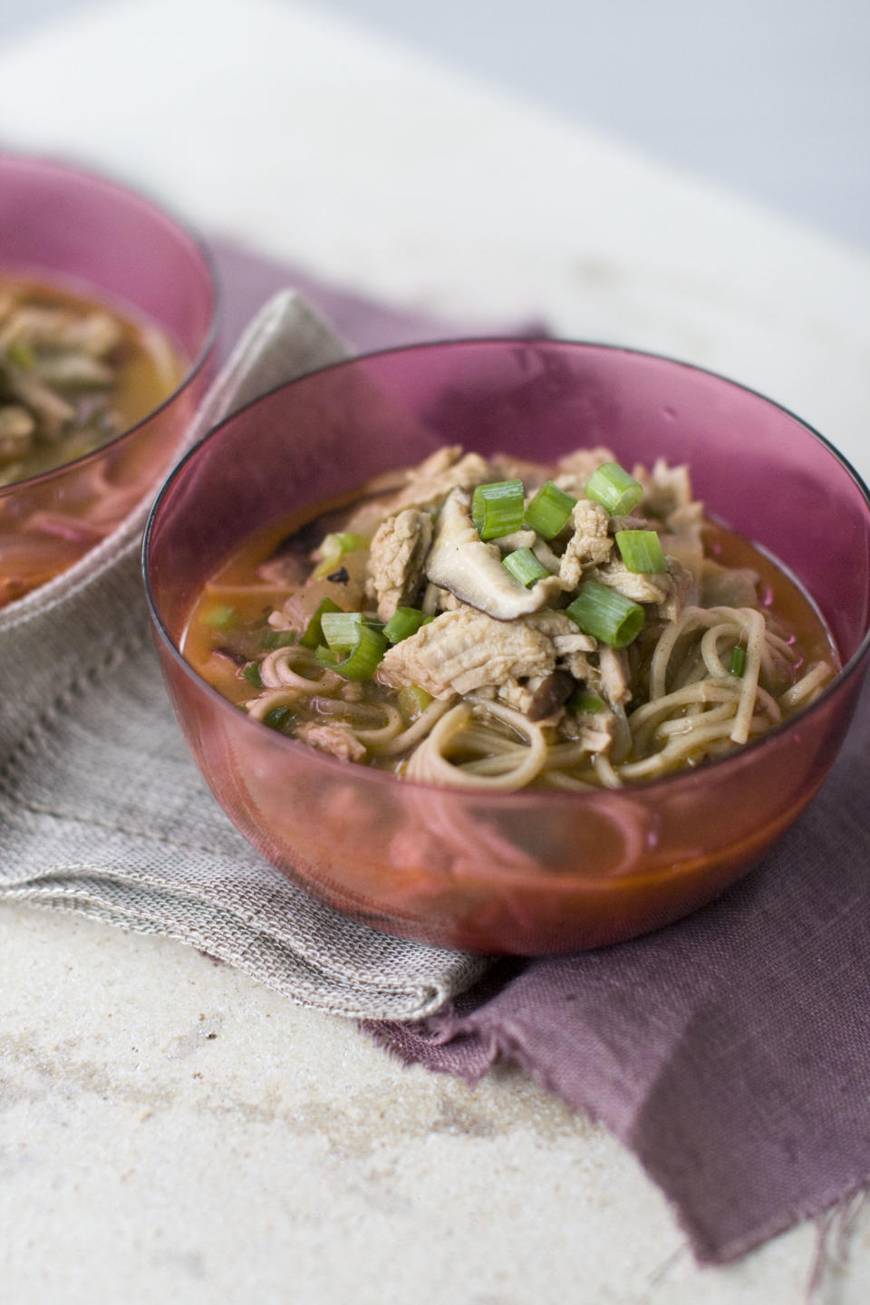 This Aug. 26, 2013 photo shows Shiitake mushroom ginger noodle soup with garlic pork in Concord, N.H. (AP Photo/Matthew Mead)