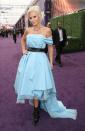 <p>In 2019, Jenny McCarthy added a punk-princess twist to her off the shoulder blue gown that looked more like a D.I.Y. project gone wrong rather than an Emmy worthy look (Image via Getty Images).</p> 