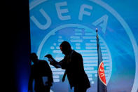 Newly elected UEFA President Aleksander Ceferin gestures on the stage after a news conference following his election in Athens, Greece September 14, 2016. REUTERS/Alkis Konstantinidis