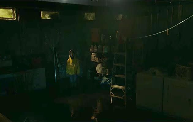 Bill sees his brother in the basement after his disappearance. Source: Warner Bros