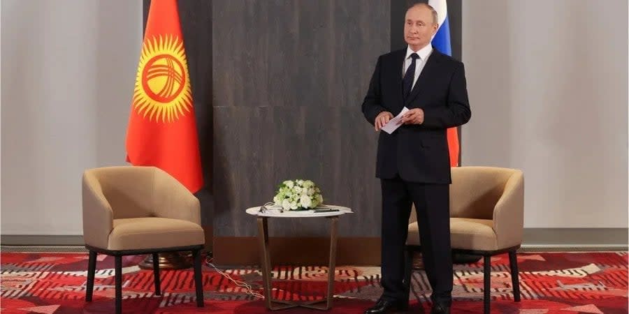 Russian dictator Vladimir Putin waits to meet with Kyrgyz President Sadyr Zhaparov