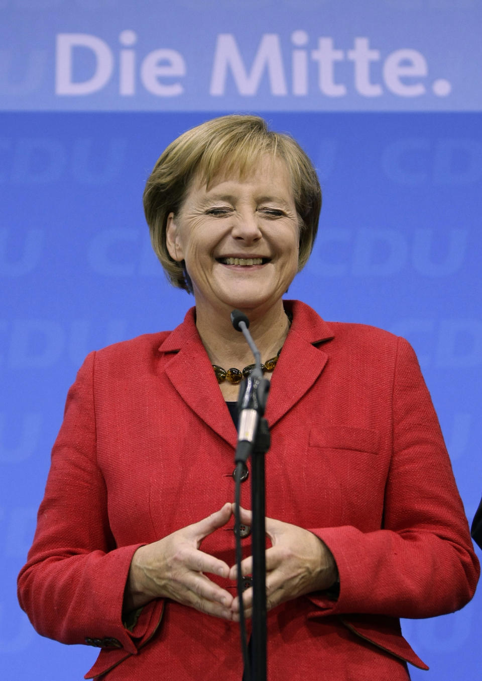 Angela Merkel, German Chancellor and leader of the conservative Christian Democratic Union party (CDU) reacts after first exit polls in the German general election (Bundestagswahl) at party headquarters in Berlin September 27, 2009. Merkel's conservatives appear to have won enough votes in a German election to form a centre-right government with their preferred partners, the Free Democrats (FDP), exit polls showed on Sunday.  REUTERS/Kai Pfaffenbach  (GERMANY)