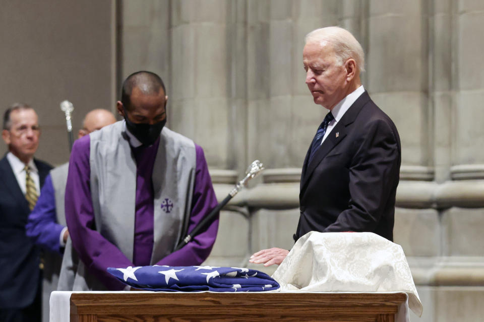 President Joe Biden attends the funeral service for former Virginia Sen. John Warner at the Washington National Cathedral, Wednesday, June 23, 2021, in Washington. (Oliver Contreras/Pool via AP)