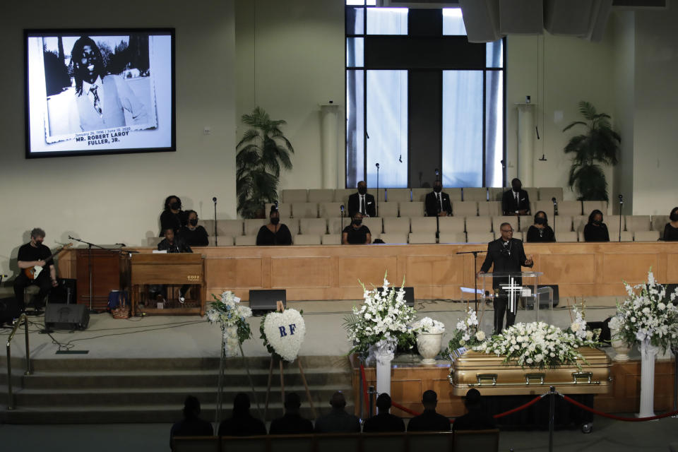 A pastor eulogizes Robert Fuller during a funeral in his honor Tuesday, June 30, 2020, in Littlerock, Calif. Fuller, a 24-year-old Black man was found hanging from a tree in a park in a Southern California high desert city. Authorities initially said the death of Fuller appeared to be a suicide but protests led to further investigation, which continues. (AP Photo/Marcio Jose Sanchez)