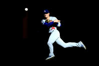 <p>MILWAUKEE, WI – OCTOBER 13: Enrique Hernandez #14 of the Los Angeles Dodgers fields the ball against the Milwaukee Brewers during the first inning in Game Two of the National League Championship Series at Miller Park on October 13, 2018 in Milwaukee, Wisconsin. (Photo by Stacy Revere/Getty Images) </p>