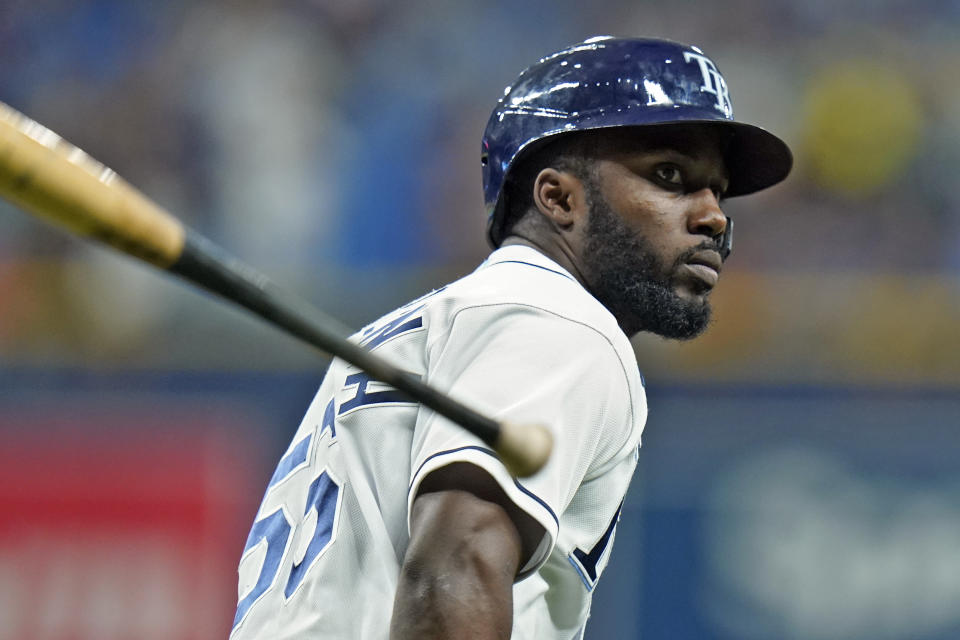 Tampa Bay Rays' Randy Arozarena flips his bat after his solo home run off Seattle Mariners' Yusei Kikuchi during the first inning of a baseball game Tuesday, Aug. 3, 2021, in St. Petersburg, Fla. (AP Photo/Chris O'Meara)