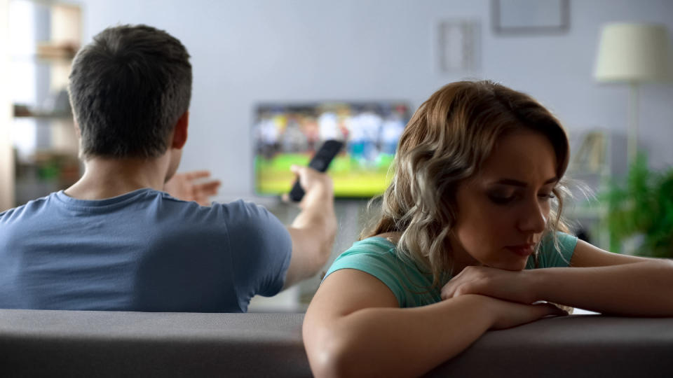 Couple arguing over watching tv, man and woman having conflict, relationship