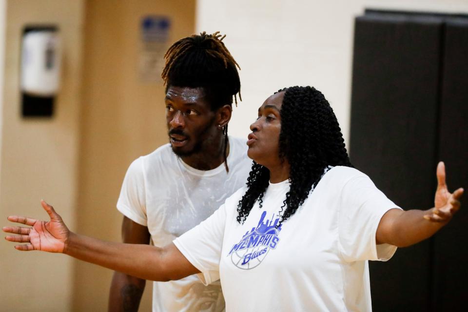 Alondray Rogers speaks with Kelvin Bonner during a practice for Memphis Blues, a semi-pro basketball team Rogers owns and coaches, at Penny’s Gym in Memphis, Tenn., on Monday, April 1, 2024. The team offers a chance for area basketball players to extend their careers after college with hopes of landing on a professional team whether in the U.S. or abroad.