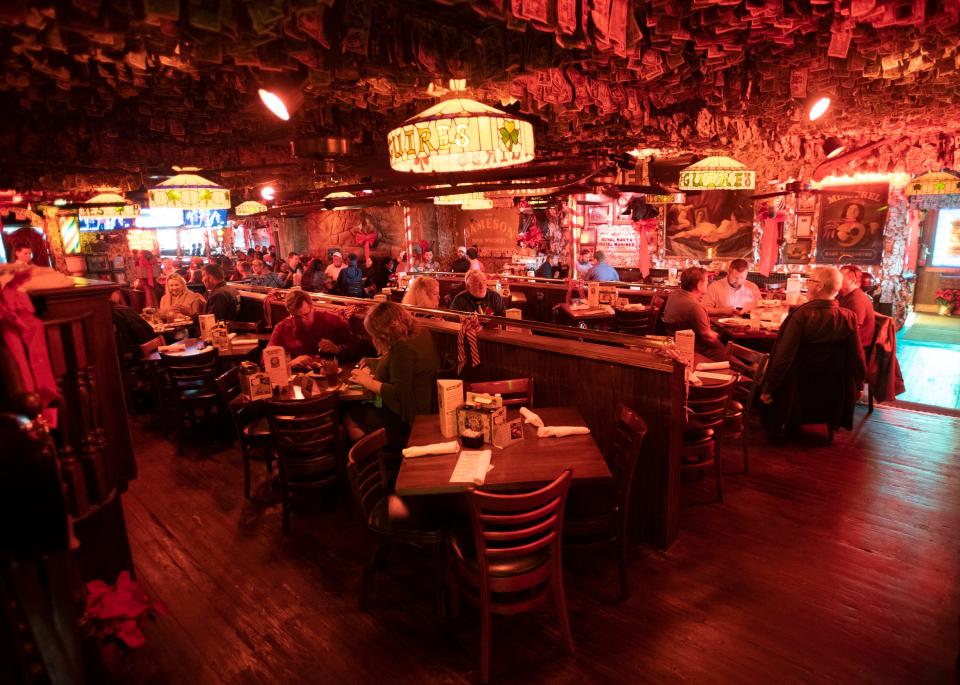 McGuire's Irish Pub patrons enjoy a meal at the popular Pensacola restaurant on Wednesday, Dec. 16, 2020.