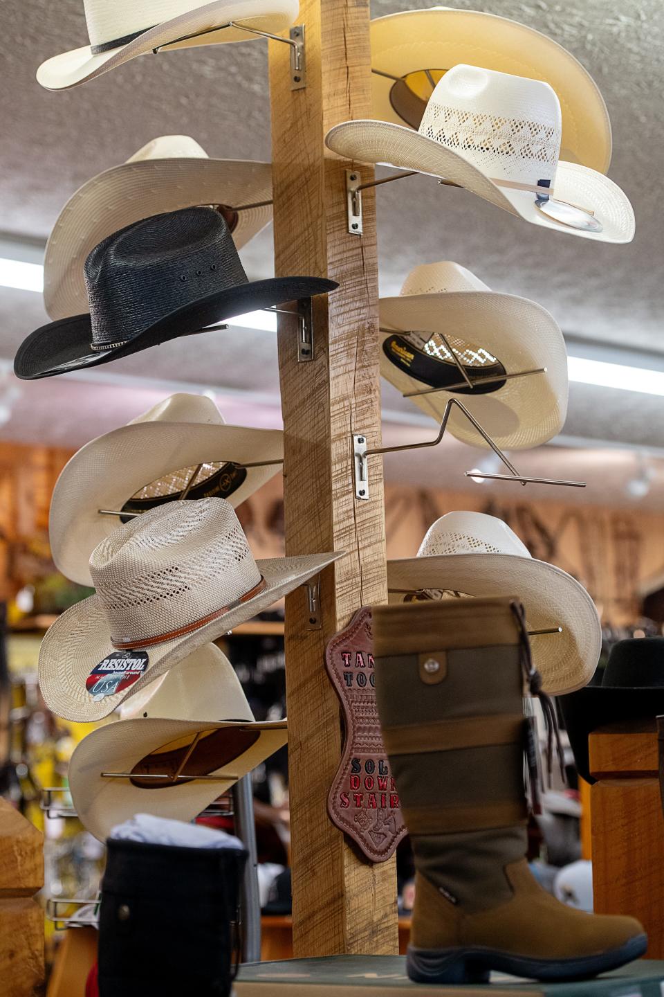 Hats and boots on display for sale at Jackson's Western Store in Asheville, May 1, 2024.