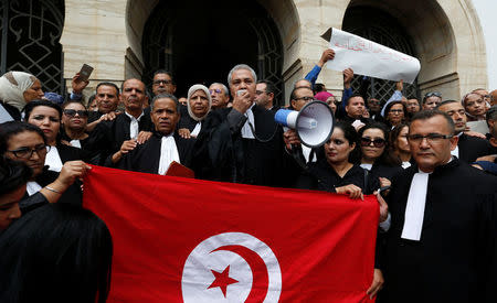 Tunisian lawyers gather as they demonstrate against the government's proposed new taxes, near the courthouse, in Tunis, Tunisia October 21, 2016. REUTERS/Zoubeir Souissi