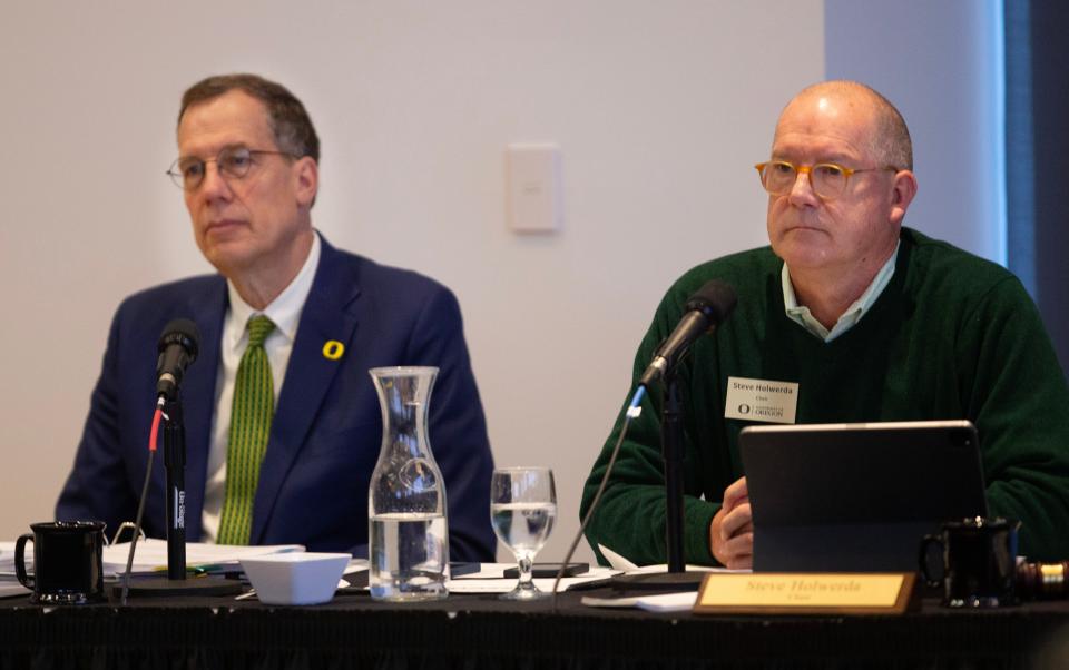 University of Oregon President Karl Scholz, left, and Board Chair Steve Holwerda listen to testimony Tuesday from pro-Palestine and climate change protestors during a meeting of the University of Oregon Board of Trustees.