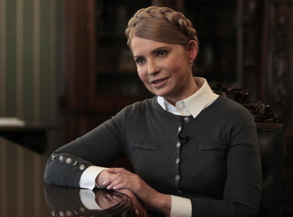 Former Ukrainian Prime Minister and candidate for the upcoming presidential elections Yulia Tymoshenko speaks during an interview with The Associated Press in Kiev, Ukraine, Saturday, April 26, 2014. Tymoshenko says Ukraine “must be a member of NATO” in order to protect itself from Russian aggression. While Tymoshenko has not previously backed NATO membership publicly, she and other Ukrainian politicians have ramped up the tough rhetoric as pro-Russia militias seized police stations and government buildings across eastern Ukraine. (AP Photo/Sergei Chuzavkov)