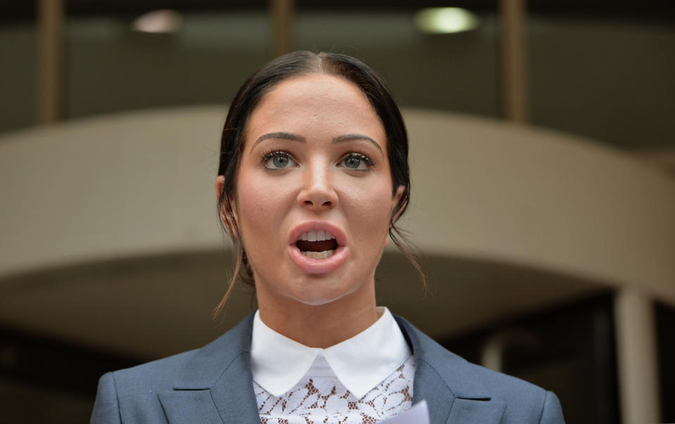 Tulisa Contostavlos makes a statement to the waiting media as she leaves Stratford Magistrates Court in London where she was found guilty of hitting Savvas Morgan during an altercation at V-Festival in Essex.