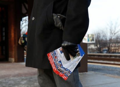 U.S. Congressman Daniel Lipinski campaigns for re-election at the Chicago Ridge Metra commuter train station in Chicago Ridge, Illinois, U.S. January 25, 2018. Picture taken January 25, 2018. REUTERS/Kamil Krzacznski