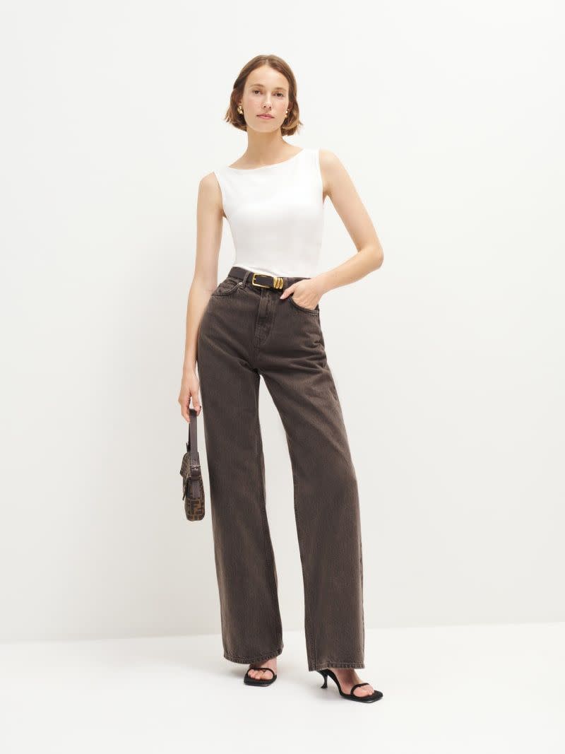 <p><a href="https://go.redirectingat.com?id=74968X1596630&url=https%3A%2F%2Fwww.thereformation.com%2Fproducts%2Fcary-high-rise-slouchy-wide-leg-jeans%2F1310310OLO.html%3Fdwvar_1310310OLO_color%3DVTE%26quantity%3D1&sref=https%3A%2F%2Fwww.townandcountrymag.com%2Fstyle%2Ffashion-trends%2Fg39399216%2Fbest-wide-leg-jeans%2F" rel="nofollow noopener" target="_blank" data-ylk="slk:Shop Now;elm:context_link;itc:0;sec:content-canvas" class="link ">Shop Now</a></p><p>Cary High Rise Slouchy Wide Leg Jeans</p><p>thereformation.com</p><p>$148.00</p>