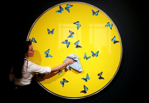 Damien Hirst, smashing yellow ball at peace