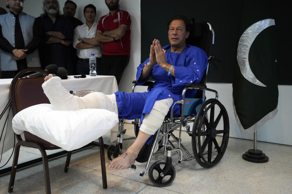 Former Pakistani Prime Minister Imran Khan speaks during a news conference in Shaukat Khanum hospital, where is being treated for a gunshot wound in Lahore, Pakistan, Friday, Nov. 4, 2022. Khan's protest march and rallies were peaceful until the afternoon attack on Thursday, when a gunman opened fire at his campaign truck. The shooting has raised concerns about growing political instability in Pakistan, a country with a history of political violence and assassinations.(AP Photo/K.M. Chaudhry)