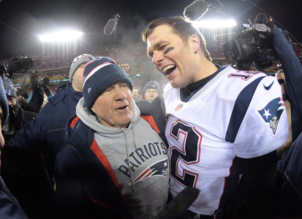 Jan 20, 2019; Kansas City, MO, USA; New England Patriots quarterback Tom Brady (12) celebrates with coach Bill Belichick after the AFC Championship game against the Kansas City Chiefs at Arrowhead Stadium. The Patriots defeated the Chiefs 37-31 in overtime to advance to fifth Super Bowl in eight seasons. Mandatory Credit: Kirby Lee-USA TODAY Sports