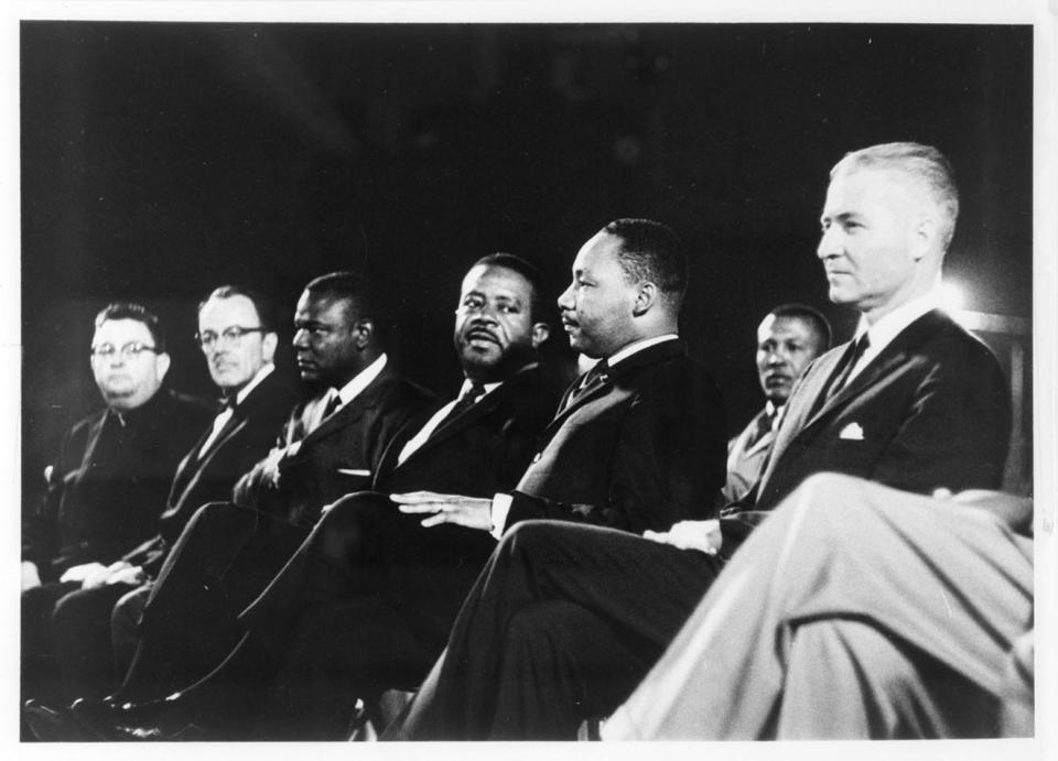 This photo Courtesy of Monsignor Robert Donahoe Collection, Arizona Collection, Arizona State University Libraries, from right, G. Homer Durham, Martin Luther King, Jr., Ralph Abernathy, an unidentified participant, Rev. Louis Eaton and Msgr. Robert Donahoe at Goodwin Stadium, Arizona State University. Mary Scanlon had no idea a $3 purchase from a Goodwill store in Phoenix would turn out to be a rare link to the civil rights movement's most revered leader. Last April, Scanlon was at the thrift store when she spotted a pile of 35 vintage reel-to-reel tapes, including one labeled with the Rev. Martin Luther King Jr.'s name. Despite the moldy and torn packaging, she snapped up all of them. Arizona State University archivists have found that tape is the only known recording of speeches the slain civil rights leader gave at ASU and at a Phoenix church in June 1964. The hour-long audio has since been digitized and is now available for listening on ASU's website through June 30. Scanlon, who donated all the tapes to the school, said the find is one of the high points of her life. (AP Photo/Courtesy of Monsignor Robert Donahoe Collection, Arizona Collection, Arizona State University Libraries)