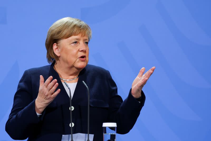 Former German Chancellor Merkel bids farewell to her successor Scholz in Berlin