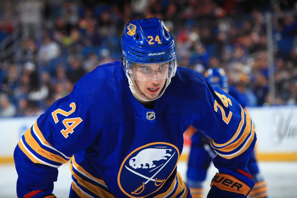 Dylan Cozens #24 of the Buffalo Sabres prepares for a faceoff during an NHL game 