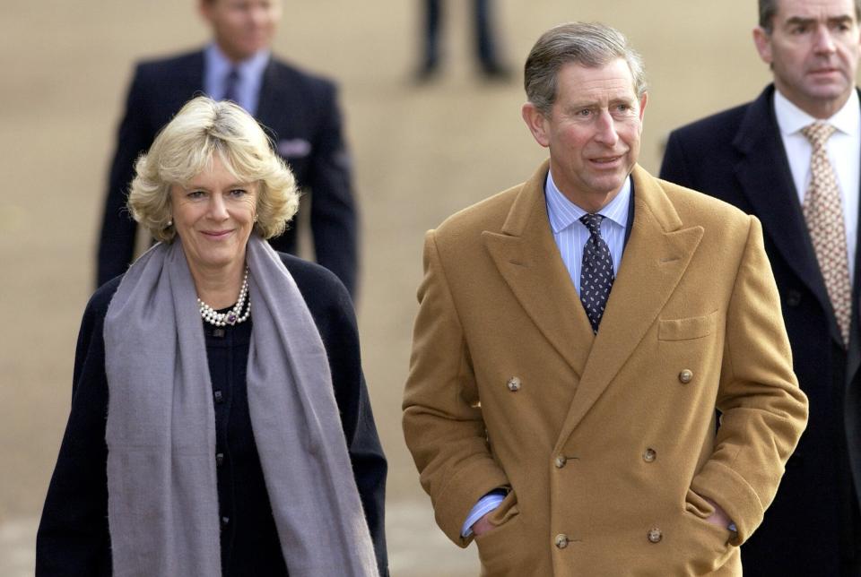 Prince Charles And Camilla Parker-bowles Walking Together In Green Park On Their Way To Host Prince Charles' Staff Christmas Lunch At The Ritz Hotel.behind At Right Is Prince Charles' Bodyguard Tony Parker