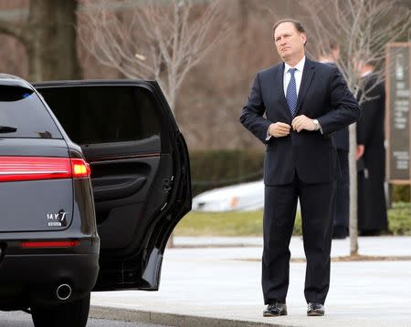 U.S. Supreme Court Justice Samuel Alito arrives for the funeral of Associate Justice Antonin Scalia at the Basilica of the National Shrine of the Immaculate Conception in Washington, DC, U.S. on February 20, 2016. REUTERS/Carlos Barria/File Photo