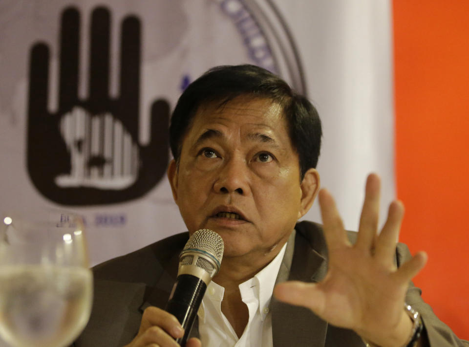 National Bureau of Investigation, Deputy Director Vicente A. de Guzman III, gestures during a press conference in Manila, Philippines on Thursday July 25, 2019. Philippine authorities announced on Thursday the capture of The European Union Agency for Law Enforcement Cooperation or EUROPOL's most wanted criminal for the production and distribution of child sexual exploitation materials on the dark-web in central Philippines. Nelson Siacor Torayno, 32, was arrested on April 12, 2019 in Cebu City where thousands of images, videos depicting children being sexually abused by an adult were found in his possession. In 2018 Queensland Police Service monitored an online surveillance that pieced together information on the location of Torayno which was likely in the Philippines and referred the case to the National Bureau of Investigation and the Philippine National Police. (AP Photo/Aaron Favila)