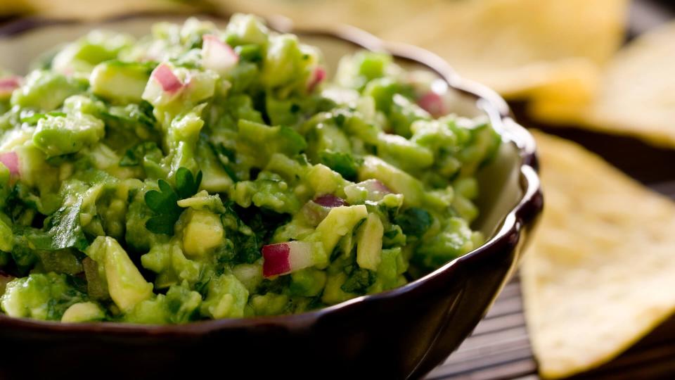 Closeup of a bowl of fresh guacamole.