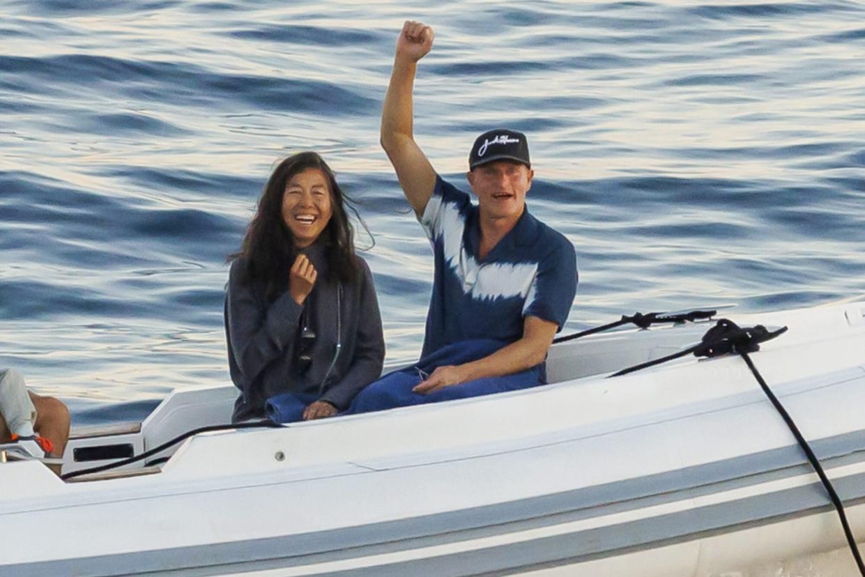 EXCLUSIVE: Woody Harrelson, waved to the passengers on the ship, after which he showed the middle finger to the photographer. Woody is with his wife Laura Louie. Woody Harrelson, waved to the passengers on the ship, after which he showed the middle finger to the photographer. Woody is with his wife Laura Louie. Ivo Cagalj and Milan Sabic, and Miroslav Leals /PIXSELL. Split, Croatia Date Taken: 16 Jul 2022