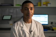 Emile Hendricks, a biotechnologist at Afrigen Biologics and Vaccines in Cape Town, South Africa, poses for a portrait Tuesday, Oct. 19, 2021. He is part of a team of young scientists that is preparing to reverse engineer Moderna's coronavirus vaccine. “We are doing this for Africa at this moment, and that drives us,” Hendricks said. ​(AP Photo/Jerome Delay)