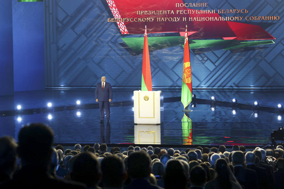 Belarus President Alexander Lukashenko arrives to deliver his speech during a state-of-the-nation address in Minsk, Belarus, Friday, Jan. 28, 2022. (Pavel Orlovsky/BelTA Pool Photo via AP)