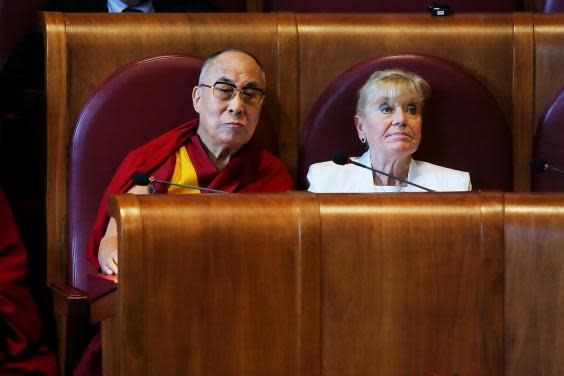 The activist with the Dalai Lama in 2014 (Getty)