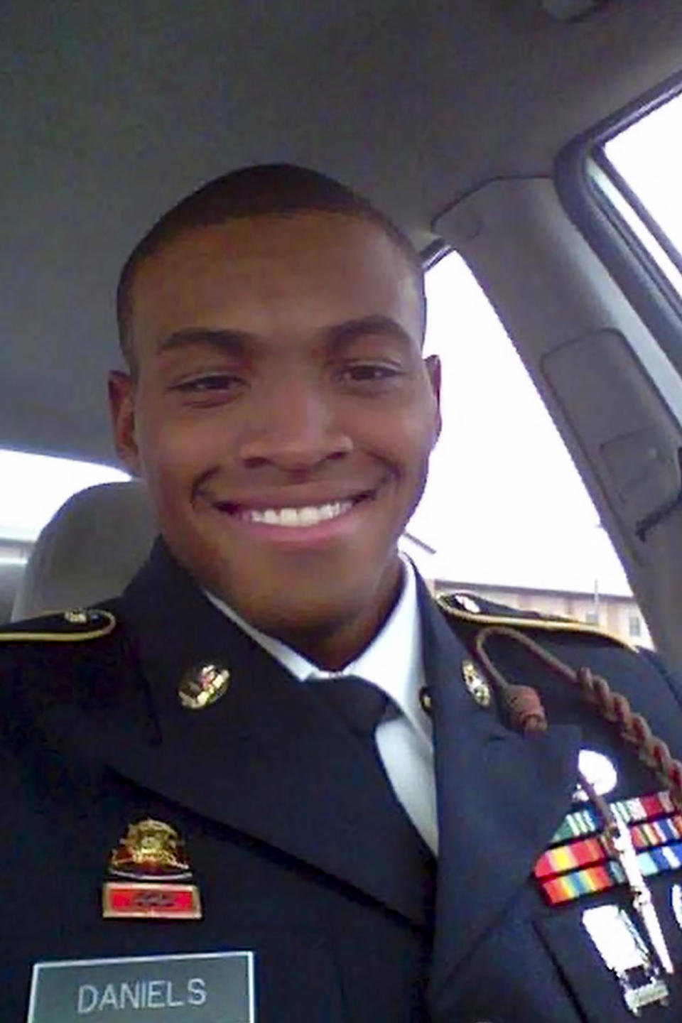 In this undated photo provided courtesy of the Daniels family, Damian Daniels poses for a selfie. Daniels, an Army veteran who moved from his home state of Alabama to Texas after serving in Afghanistan, was shot to death by a sheriff's deputy in San Antonio last month. A funeral service was held for Daniels on Friday, Sept. 11, 2020, to coincide with the anniversary of the Sept. 11 terror attacks. (Courtesy of the Daniels family via AP)