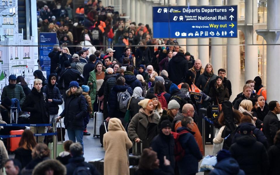 Commuters queue up for Eurostar trains to Europe at the Eurostar terminal at St.Pancras International station in London, Britain, 18 December 2022. Eurostar security staff are planing four days of strikes in the run cup to Christmas, in a dispute over pay and conditions. Strike days are planned to take place on 16, 18, 22 and 23 December, although talks are on-going to bring an end to the dispute. Eurotstar security staff strike, London, United Kingdom - Andy Rain/Shutterstock