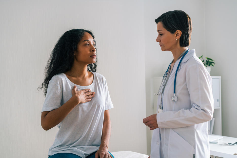 A patient talking to a doctor