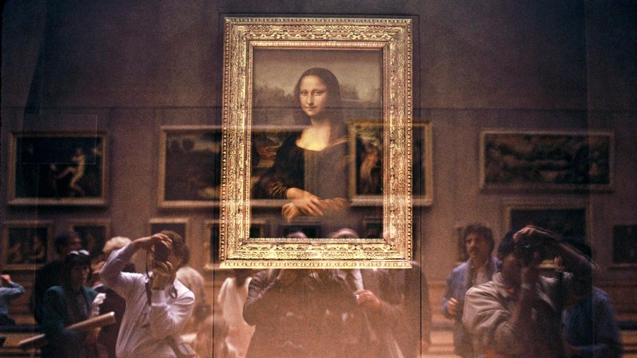  The Mona Lisa at the Louvre Museum in Paris. 