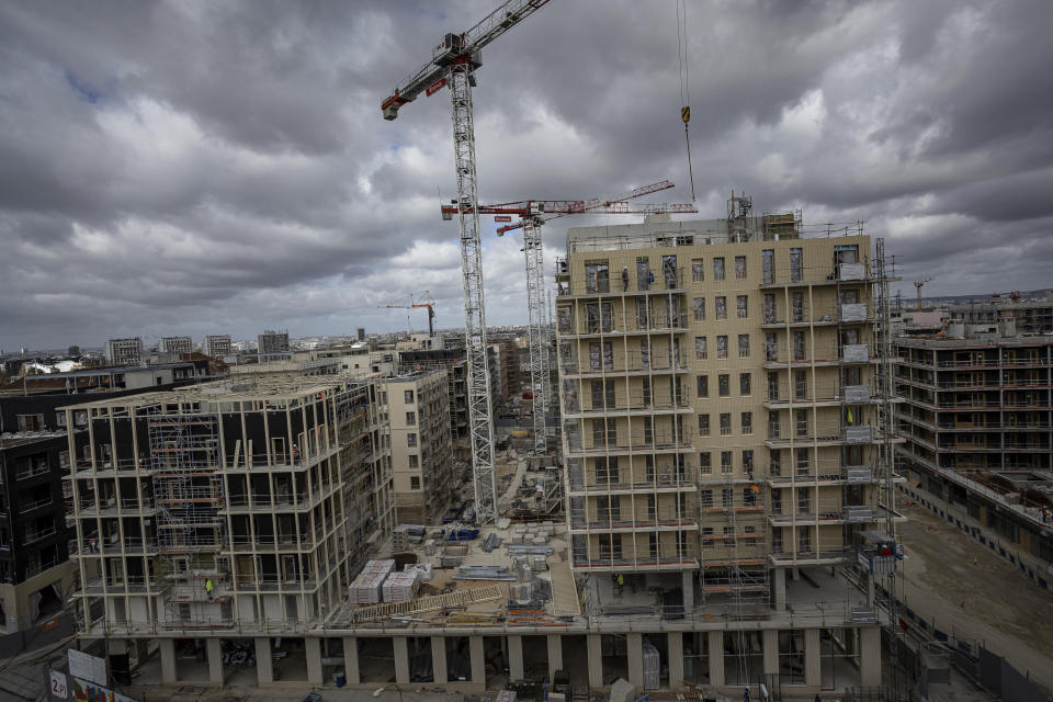 FILE - The Olympic athletes' village is under construction during a press tour in Saint Denis, outside Paris, March 24, 2023. (AP Photo/Aurelien Morissard, File)