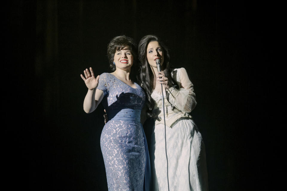 This image released by Lifetime shows Megan Hilty as Patsy Cline, left, and Jessie Mueller as Loretta Lynn in a scene from the film "Patsy & Loretta," premiering Oct. 19. (Jake Giles Netter/Lifetime via AP)