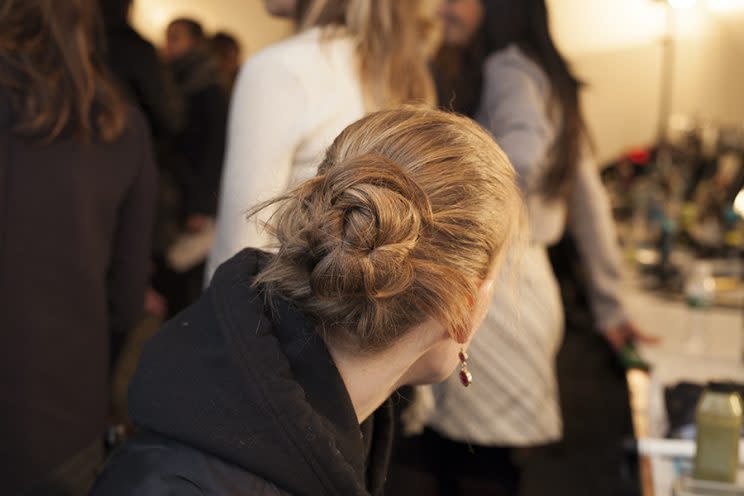 Totally twisted chignon at Monse. (Photo: Imaxtree)