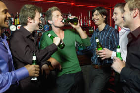 Men drinking in a bar